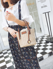 2021 New women's bag hand-woven contrast color bucket straw bag cylinder handbag diagonal shoulder beach bag