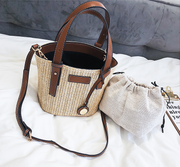 2021 New women's bag hand-woven contrast color bucket straw bag cylinder handbag diagonal shoulder beach bag